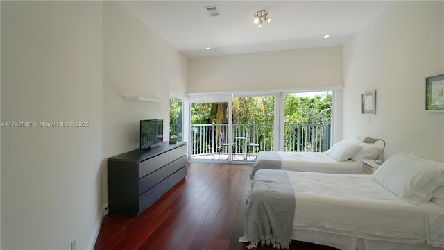 691 Ridgewood Rd, Key Biscayne, FL 33149 - bedroom featuring visible vents, dark wood-style flooring, access to outside, and multiple windows