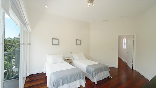 691 Ridgewood Rd, Key Biscayne, FL 33149 - bedroom with baseboards and wood-type flooring