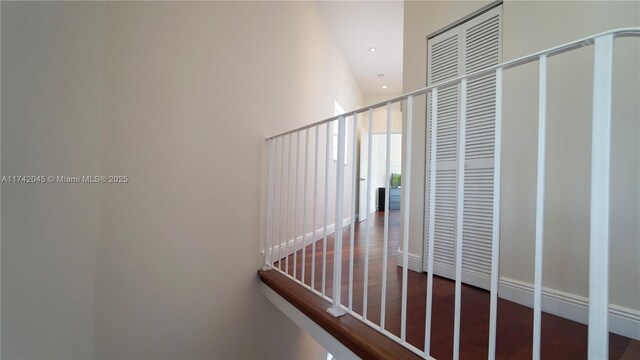691 Ridgewood Rd, Key Biscayne, FL 33149 - staircase with wood finished floors