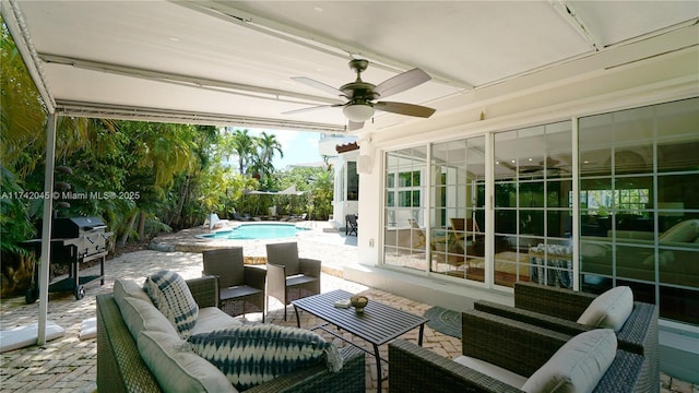 691 Ridgewood Rd, Key Biscayne, FL 33149 - view of patio / terrace with ceiling fan, outdoor lounge area, and an outdoor pool