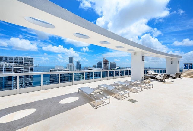 view of patio / terrace with a water view