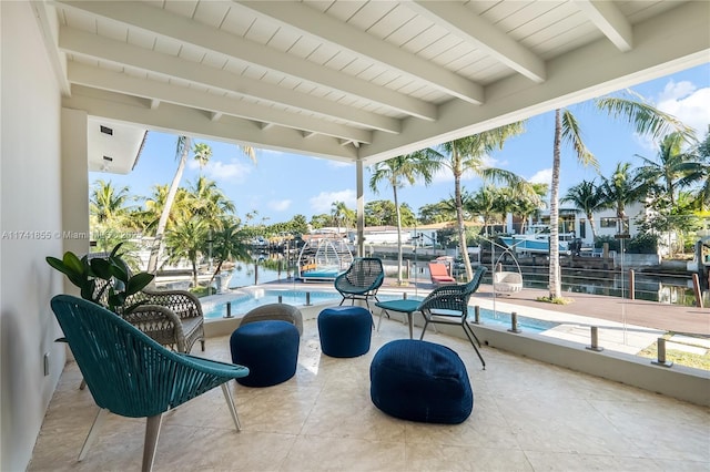 view of patio / terrace featuring a boat dock