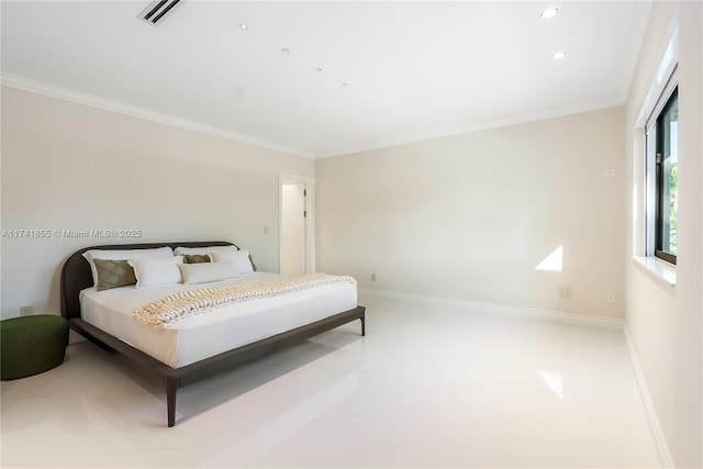 bedroom with visible vents, baseboards, and crown molding