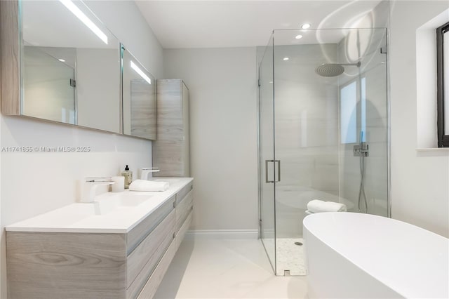 12905 Cherry Rd, North Miami, FL 33181 - full bathroom featuring a stall shower, vanity, a soaking tub, recessed lighting, and baseboards