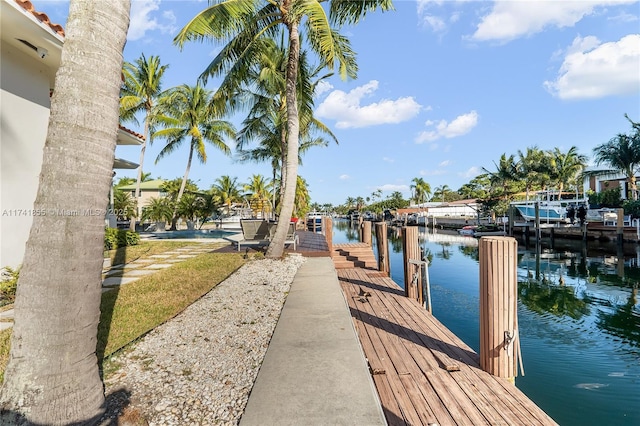 dock area featuring a water view