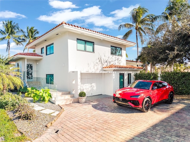 view of front of property featuring a garage