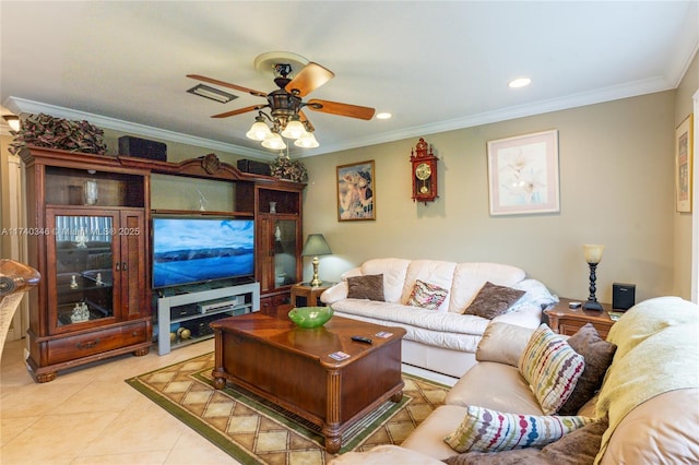 living room with ornamental molding, ceiling fan, and light tile patterned floors