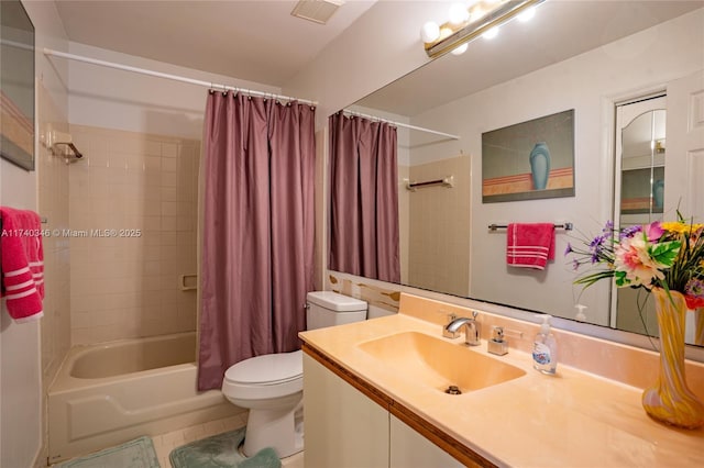 full bathroom featuring toilet, shower / bath combination with curtain, tile patterned flooring, and vanity