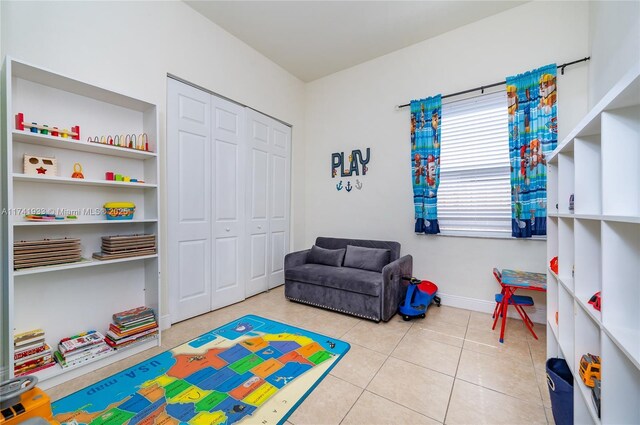 recreation room with light tile patterned floors