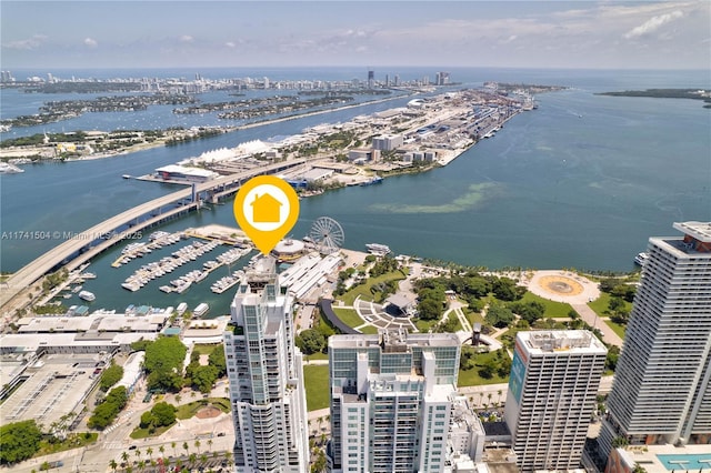 birds eye view of property featuring a water view