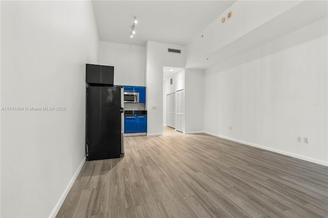 interior space with light hardwood / wood-style flooring