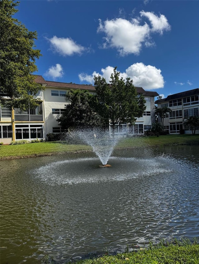 view of property's community with a water view