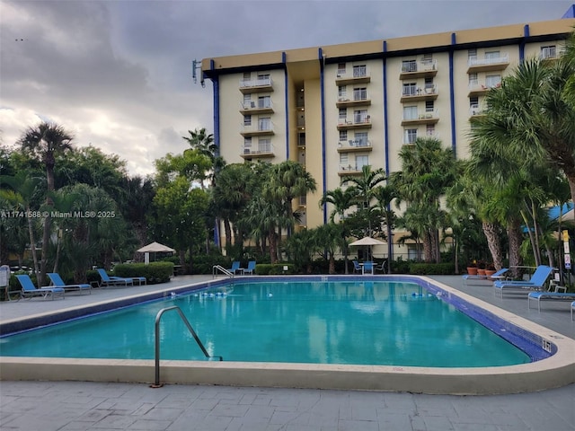 view of pool featuring a patio area