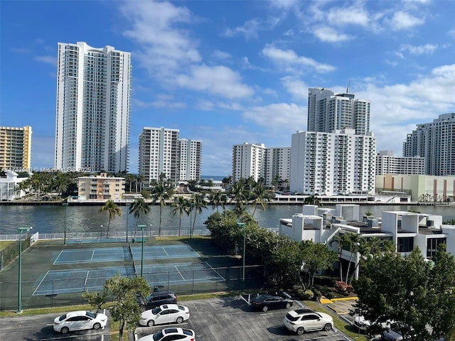 property's view of city featuring a water view