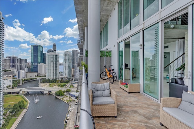 balcony featuring a water view