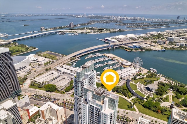 birds eye view of property featuring a water view