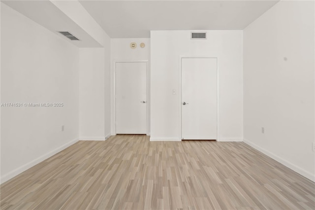 unfurnished bedroom with light hardwood / wood-style flooring