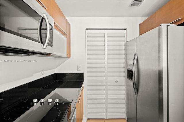 kitchen featuring appliances with stainless steel finishes