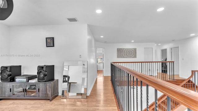 hall featuring light hardwood / wood-style flooring