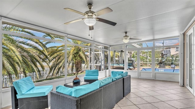 sunroom / solarium with ceiling fan