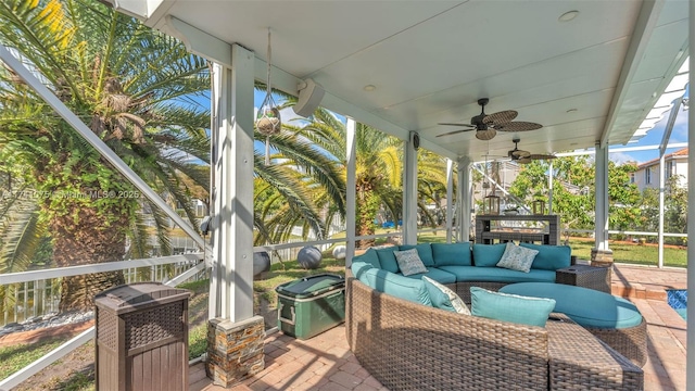 sunroom / solarium with ceiling fan