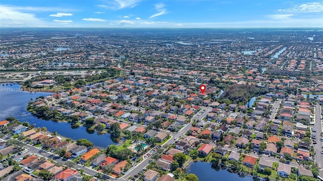 drone / aerial view featuring a water view