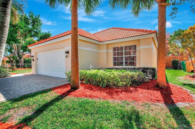 view of front of home with a garage