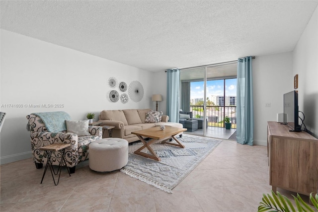 tiled living room with a textured ceiling