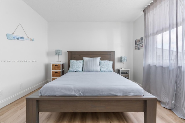 bedroom featuring light hardwood / wood-style flooring