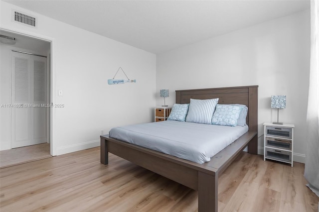 bedroom with light hardwood / wood-style flooring