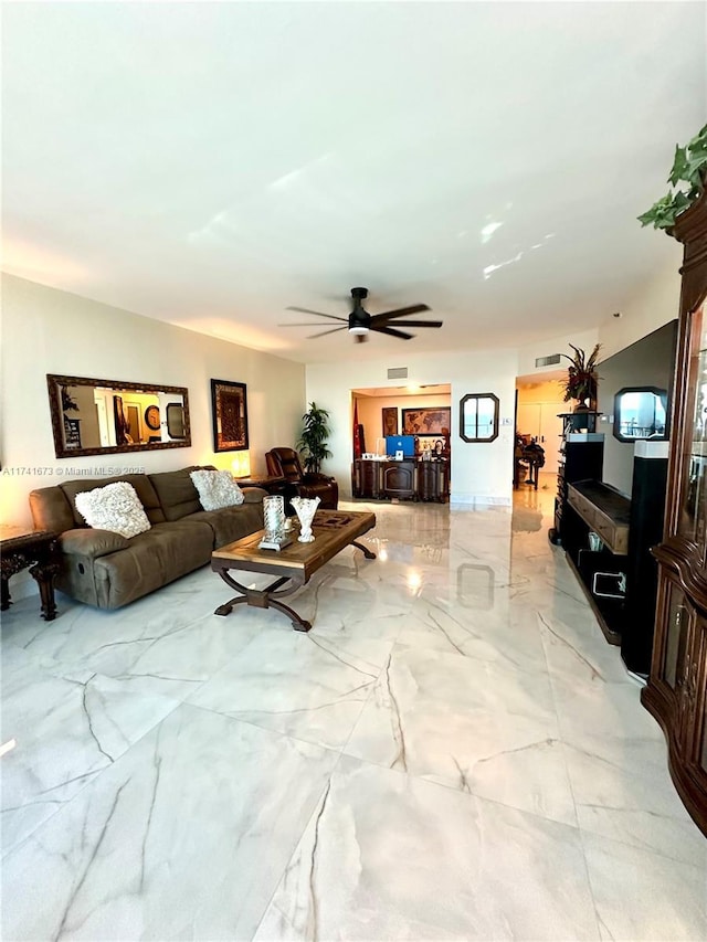 living room with ceiling fan