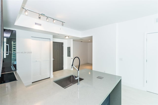 kitchen with sink and electric panel