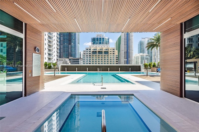 view of pool featuring a community hot tub