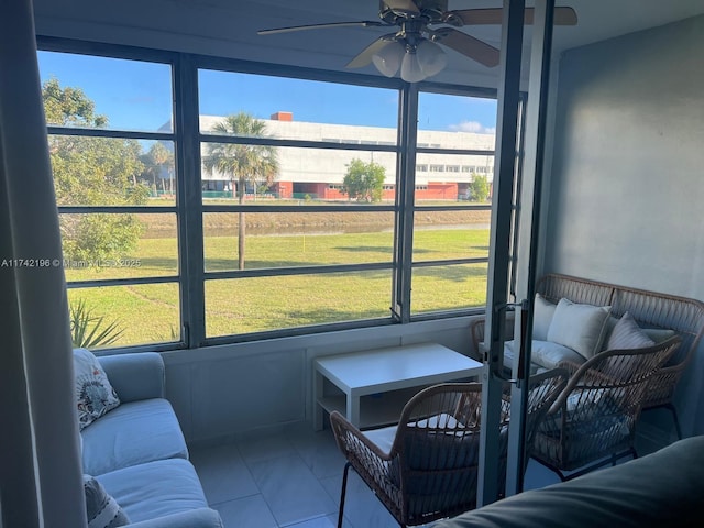 sunroom / solarium with ceiling fan