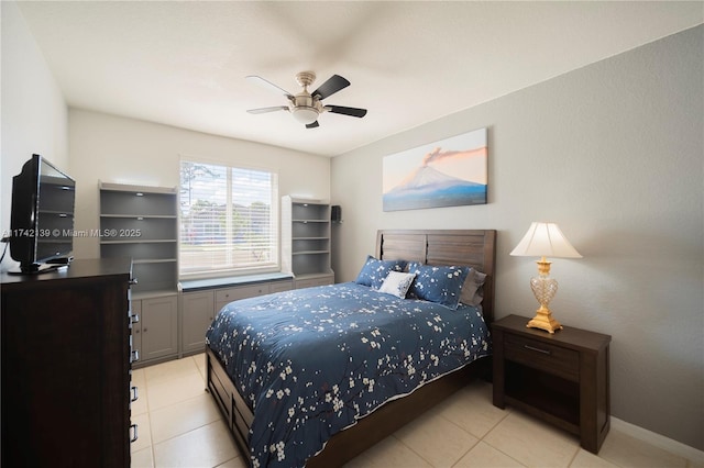 bedroom with light tile patterned floors and ceiling fan