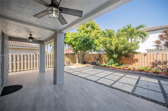 view of patio / terrace featuring ceiling fan