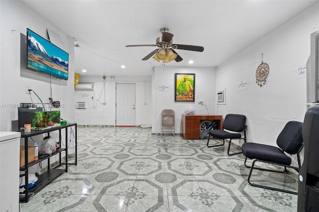 living area featuring ceiling fan