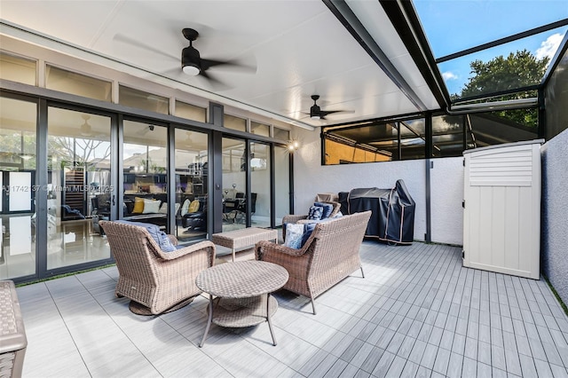 view of patio with a grill and ceiling fan