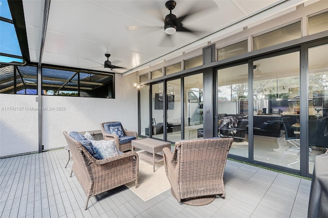 view of patio with ceiling fan