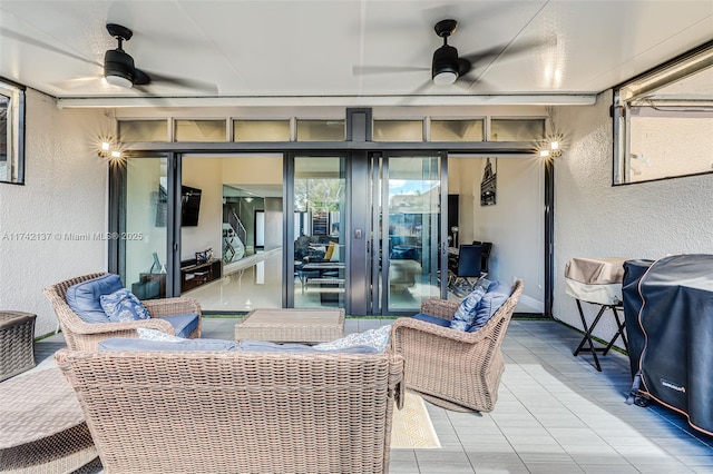 view of patio / terrace featuring area for grilling and ceiling fan