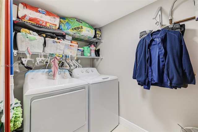 laundry area with independent washer and dryer