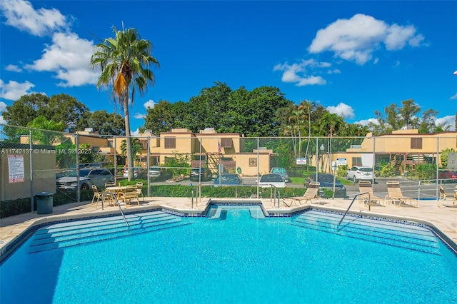 view of pool featuring a patio area