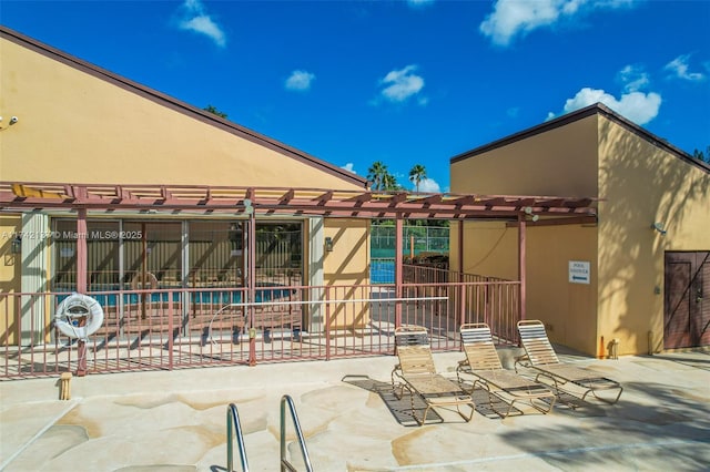 rear view of house with a patio area