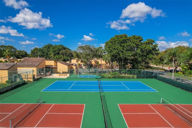 view of sport court with basketball hoop