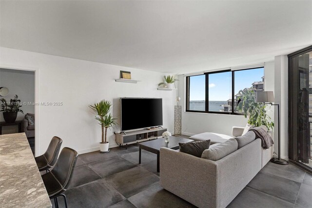540 Brickell Key Dr Unit 1519, Miami, FL 33131 - living room with baseboards