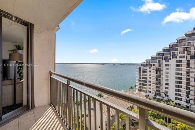 balcony featuring a water view