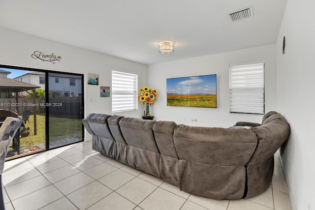 living room with light tile patterned floors