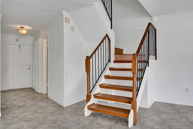 staircase with baseboards