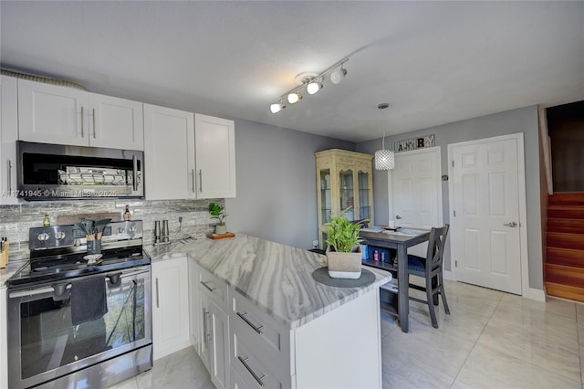 kitchen featuring stainless steel appliances, pendant lighting, white cabinets, and kitchen peninsula