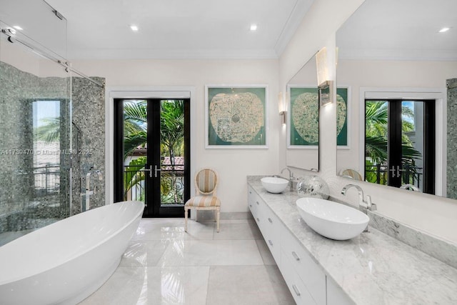 bathroom featuring vanity, ornamental molding, french doors, and independent shower and bath